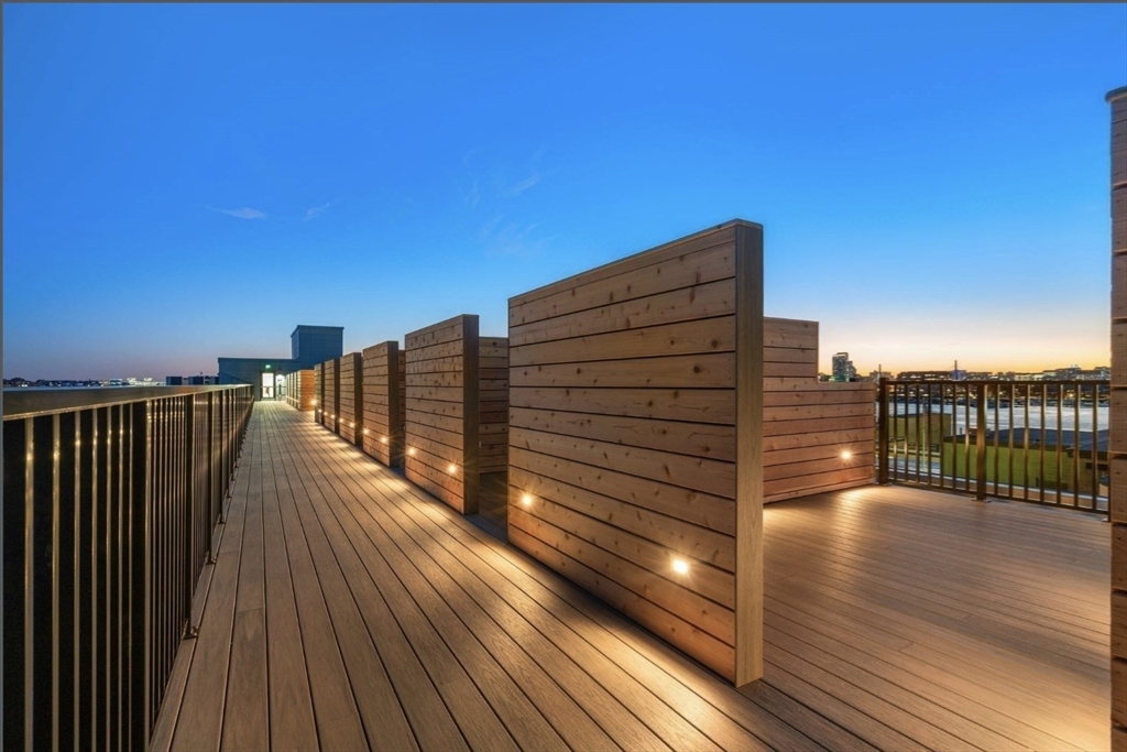 301 Border Street, Unit 610 Boston, MA 02128 - Photo 7 of 17 a view of balcony with wooden floor and city view