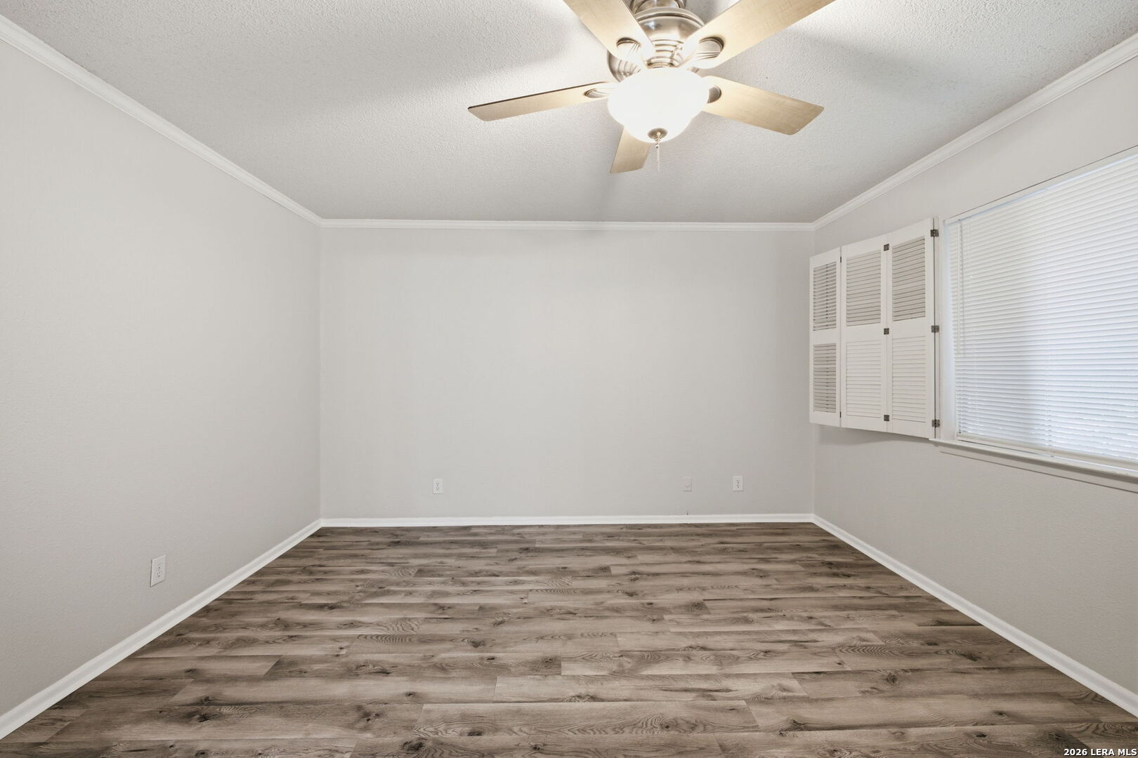 6106 Vance Jackson Road, Unit 15 San Antonio, TX 78230 - Photo 22 of 30 wooden floor in an empty room