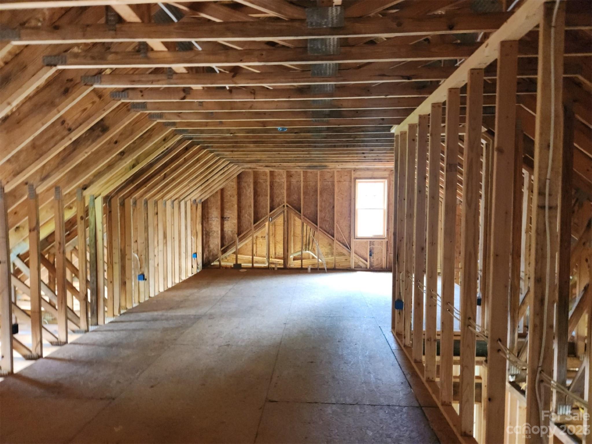 134 Lake George Road, Unit 969 & 970 Old Fort, NC 28762 - Photo 24 of 28 a view of an empty room with wooden floor
