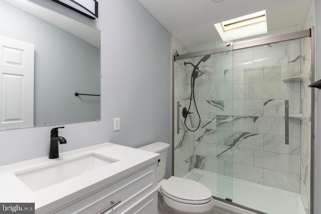 2202 Gregory Drive Forest Hill, MD 21050 - Photo 19 of 25 Hall bath w\quartz vanity top and walk in shower