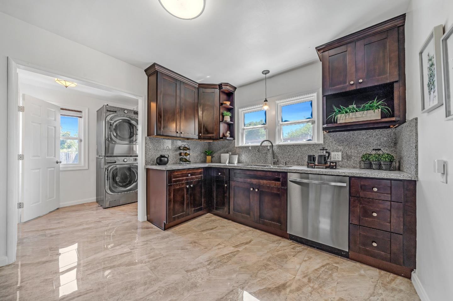 1490 Plaza Drive San Leandro, CA 94578 - Photo 11 of 39 a kitchen with stainless steel appliances granite countertop a refrigerator and a stove top oven