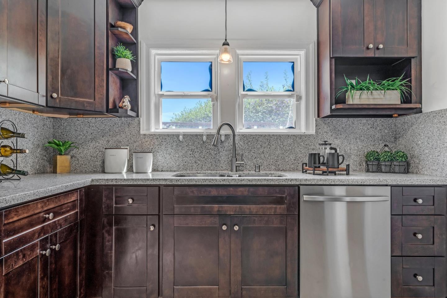 1490 Plaza Drive San Leandro, CA 94578 - Photo 12 of 39 a kitchen with stainless steel appliances granite countertop a sink a stove and cabinets