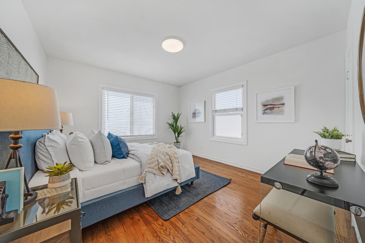 1490 Plaza Drive San Leandro, CA 94578 - Photo 22 of 39 a living room with furniture and a wooden floor