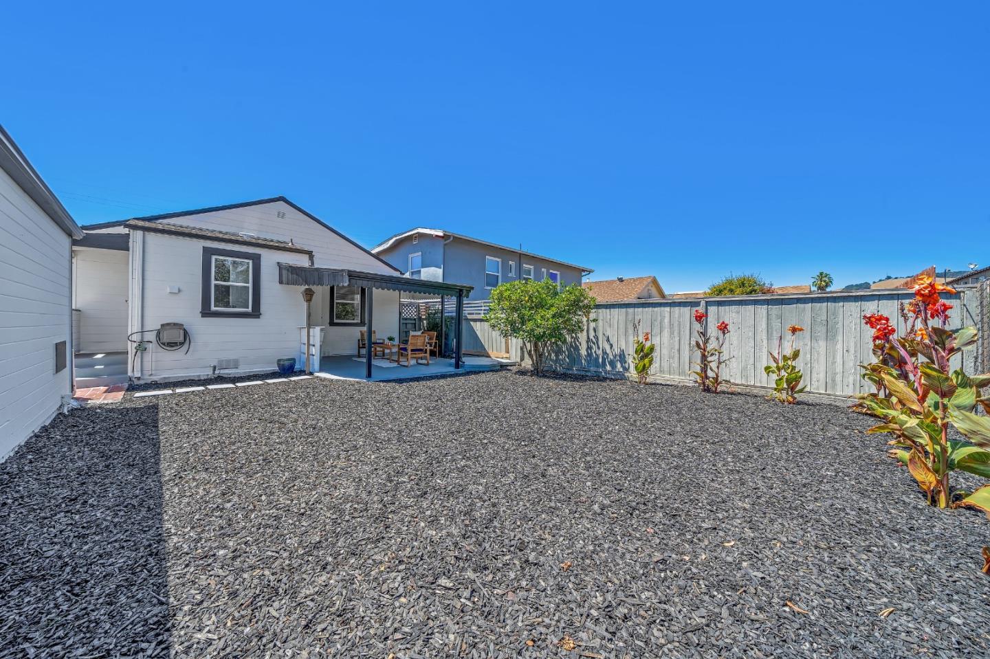 1490 Plaza Drive San Leandro, CA 94578 - Photo 32 of 39 a view of a house with a yard and large tree