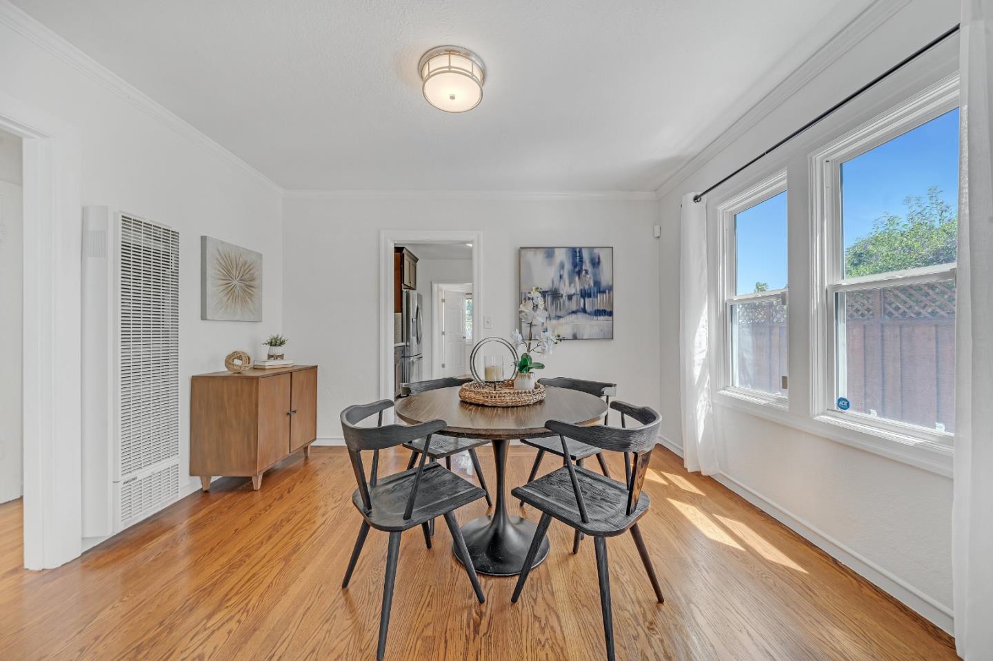1490 Plaza Drive San Leandro, CA 94578 - Photo 7 of 39 a view of a dining room with furniture and wooden floor