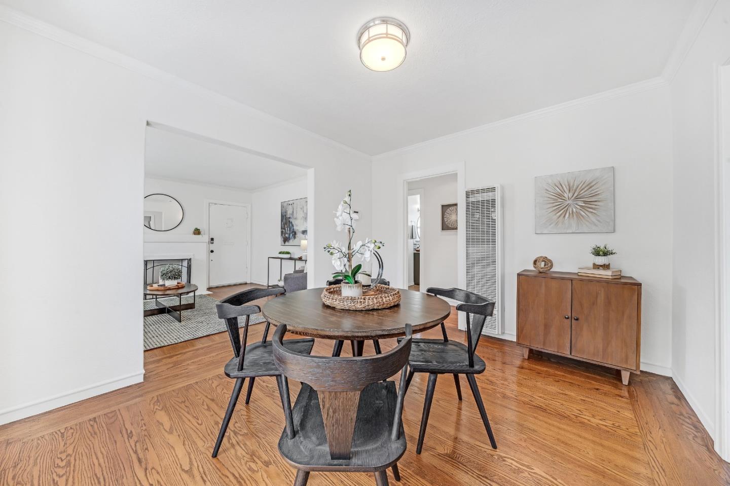 1490 Plaza Drive San Leandro, CA 94578 - Photo 9 of 39 a view of a dining room with furniture and wooden floor