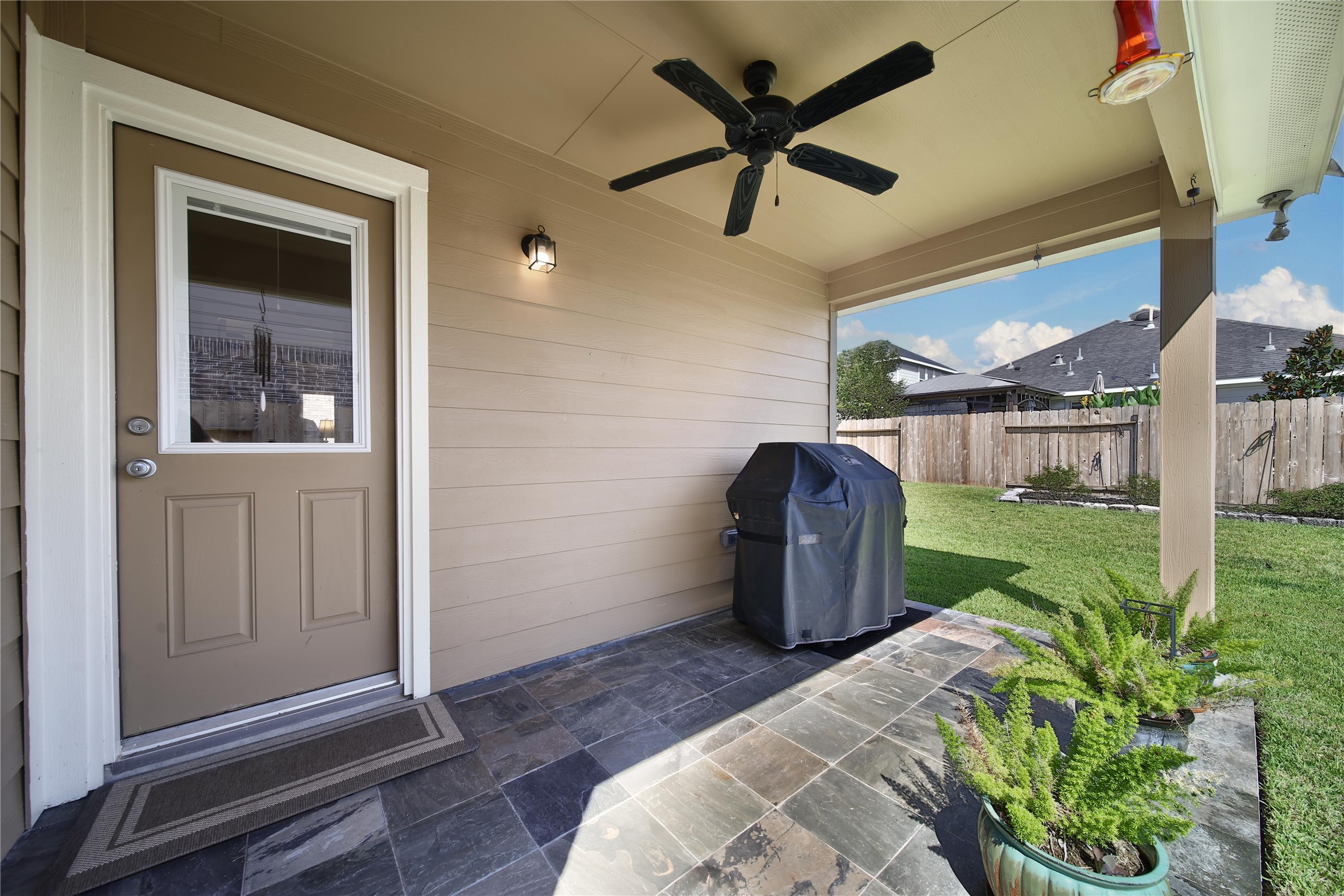 214 Pleasant Hill Way Conroe, TX 77304 - Photo 31 of 43 The back patio has a natural gas line in place for your grill or generator.