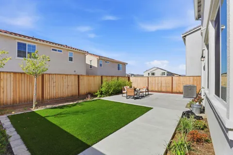 a house view with a garden space