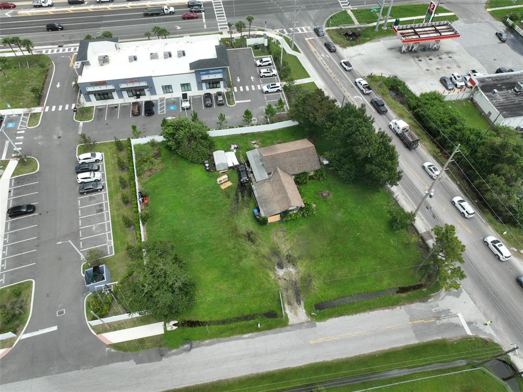 11348 Pine Street Riverview, FL 33578 - Photo 12 of 18 an aerial view of multiple houses with yard