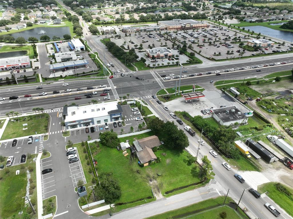 11348 Pine Street Riverview, FL 33578 - Photo 17 of 18 an aerial view of residential houses with outdoor space