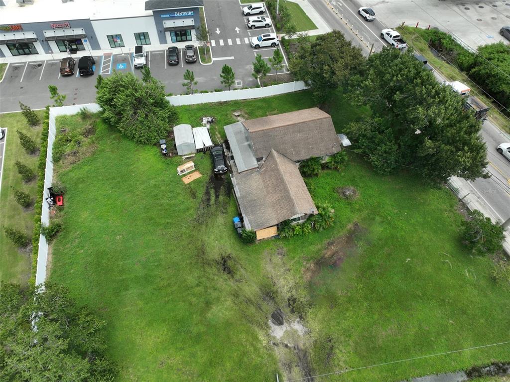 11348 Pine Street Riverview, FL 33578 - Photo 4 of 18 an aerial view of a house with a yard
