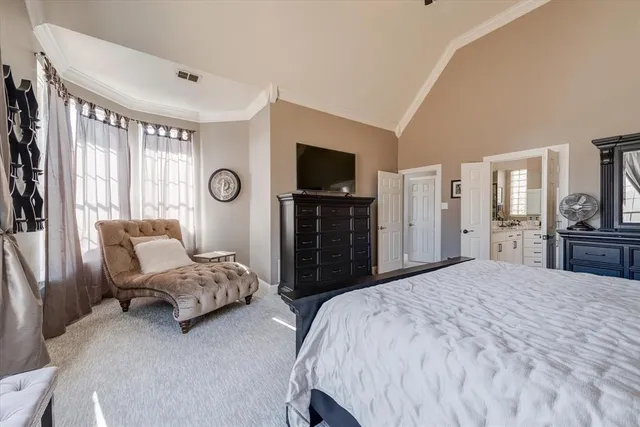a kitchen with granite countertop stainless steel appliances and wooden cabinets