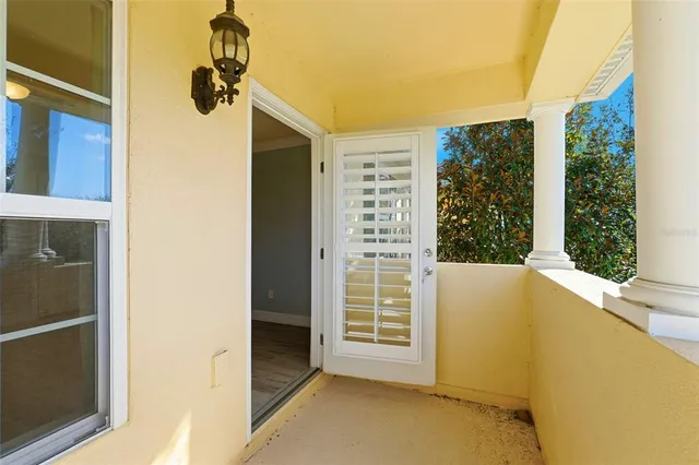 a view of a room with windows