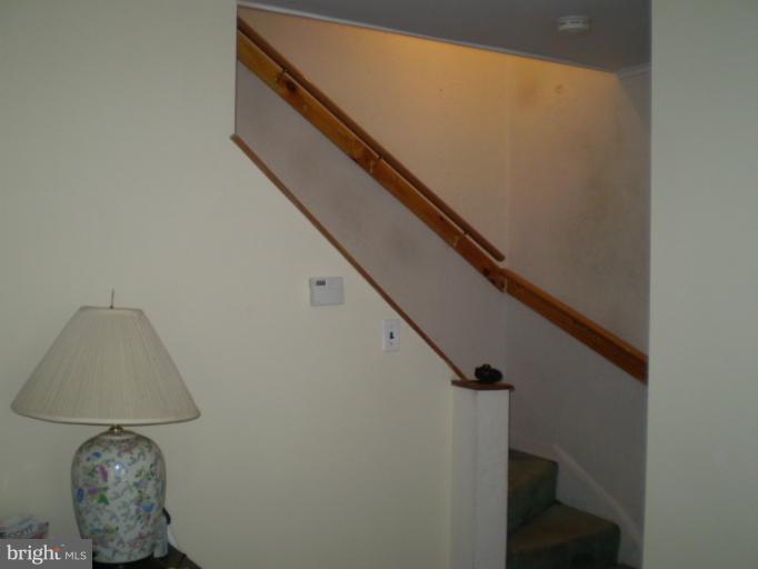 4028 Annellen Road Baltimore, MD 21215 - Photo 9 of 11 stairwell to 2nd level