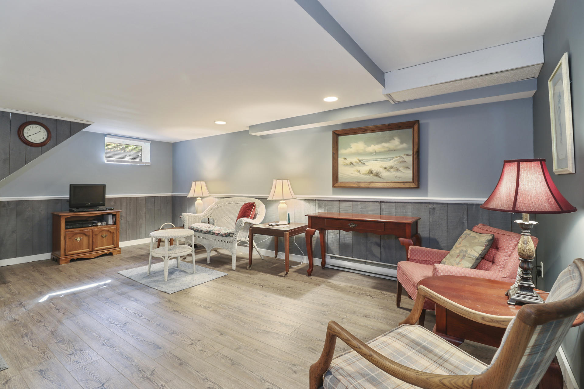 15 Ronda Lane Dennis, MA 02638 - Photo 12 of 20 a living room with furniture and a lamp