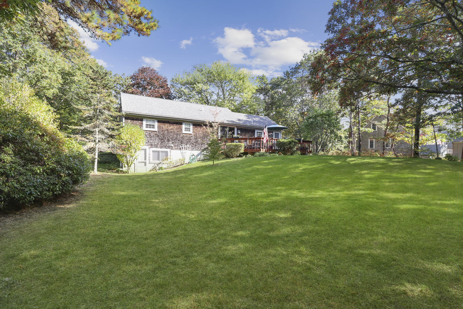 15 Ronda Lane Dennis, MA 02638 - Photo 19 of 20 a view of a house with a big yard