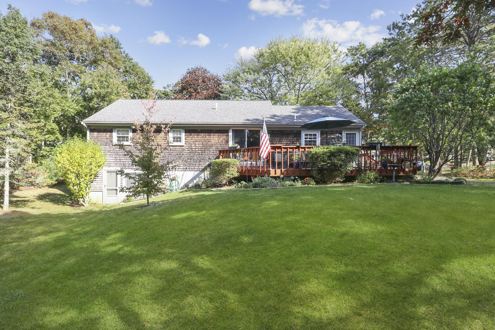 15 Ronda Lane Dennis, MA 02638 - Photo 20 of 20 a front view of a house with garden