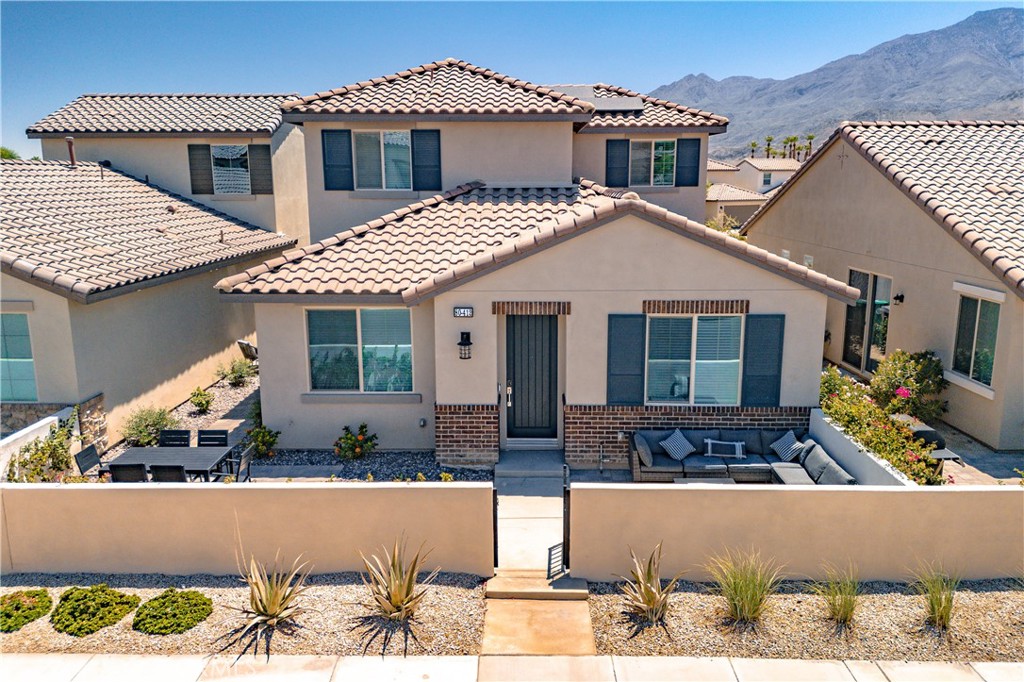 front view of a house with a balcony