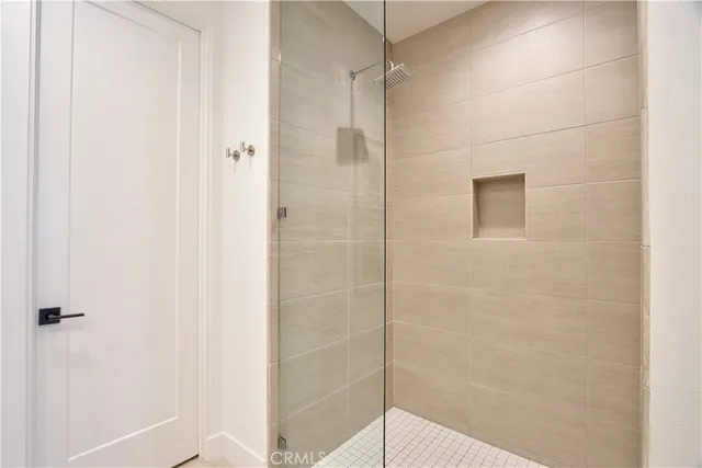 a bathroom with a sink a vanity and mirror