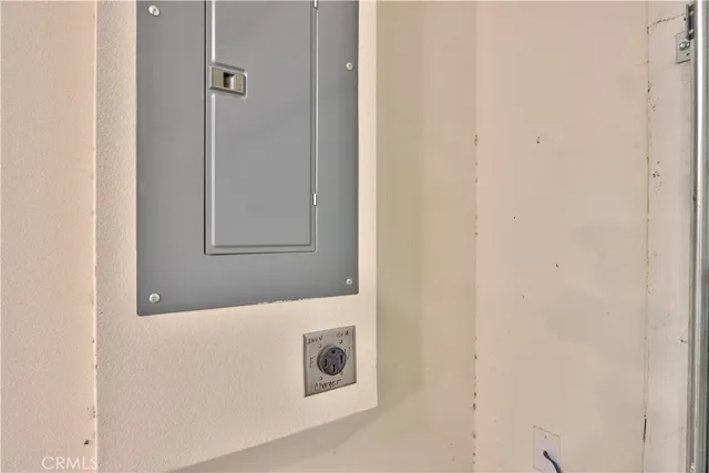 a front view of a building with garden