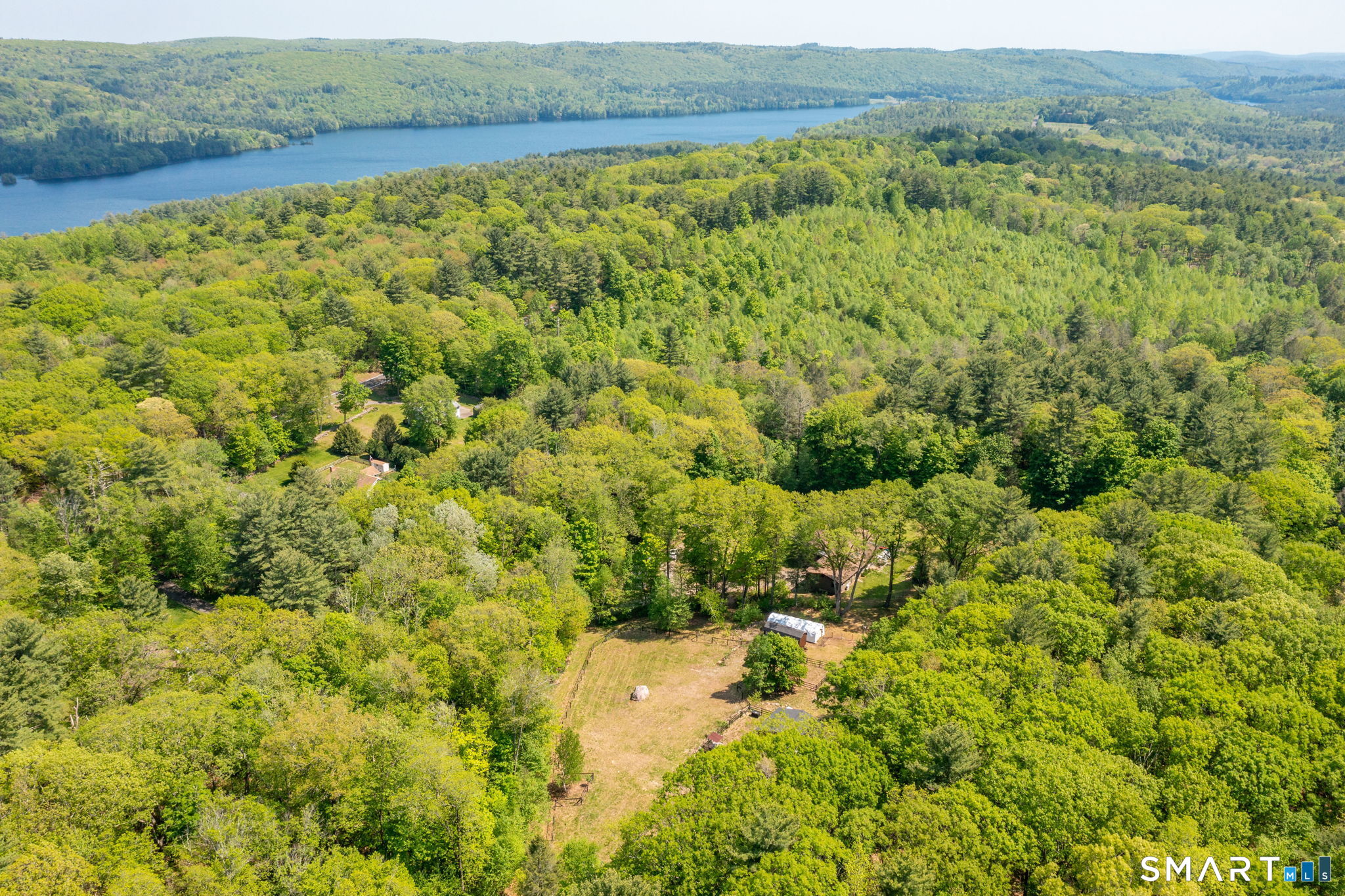 250 Center Hill Road Barkhamsted, CT 06063 - Photo 39 of 40 a view of a yard with an outdoor space