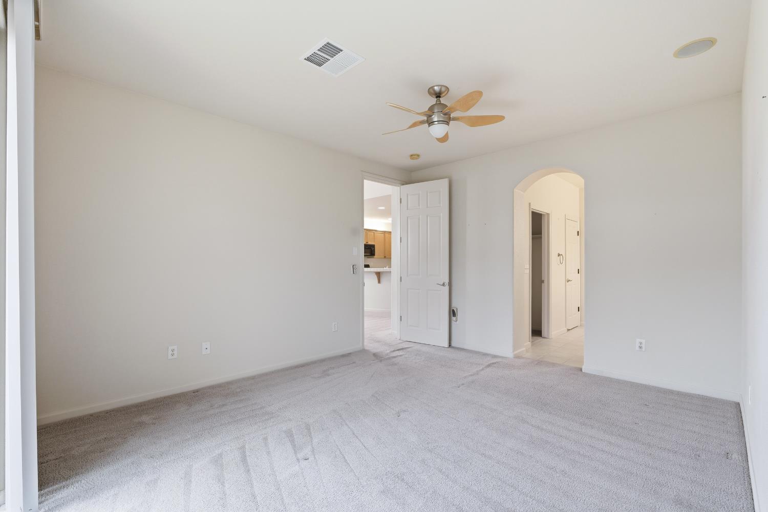 2450 Como Corte Chowchilla, CA 93610 - Photo 19 of 42 a view of an empty room with a window