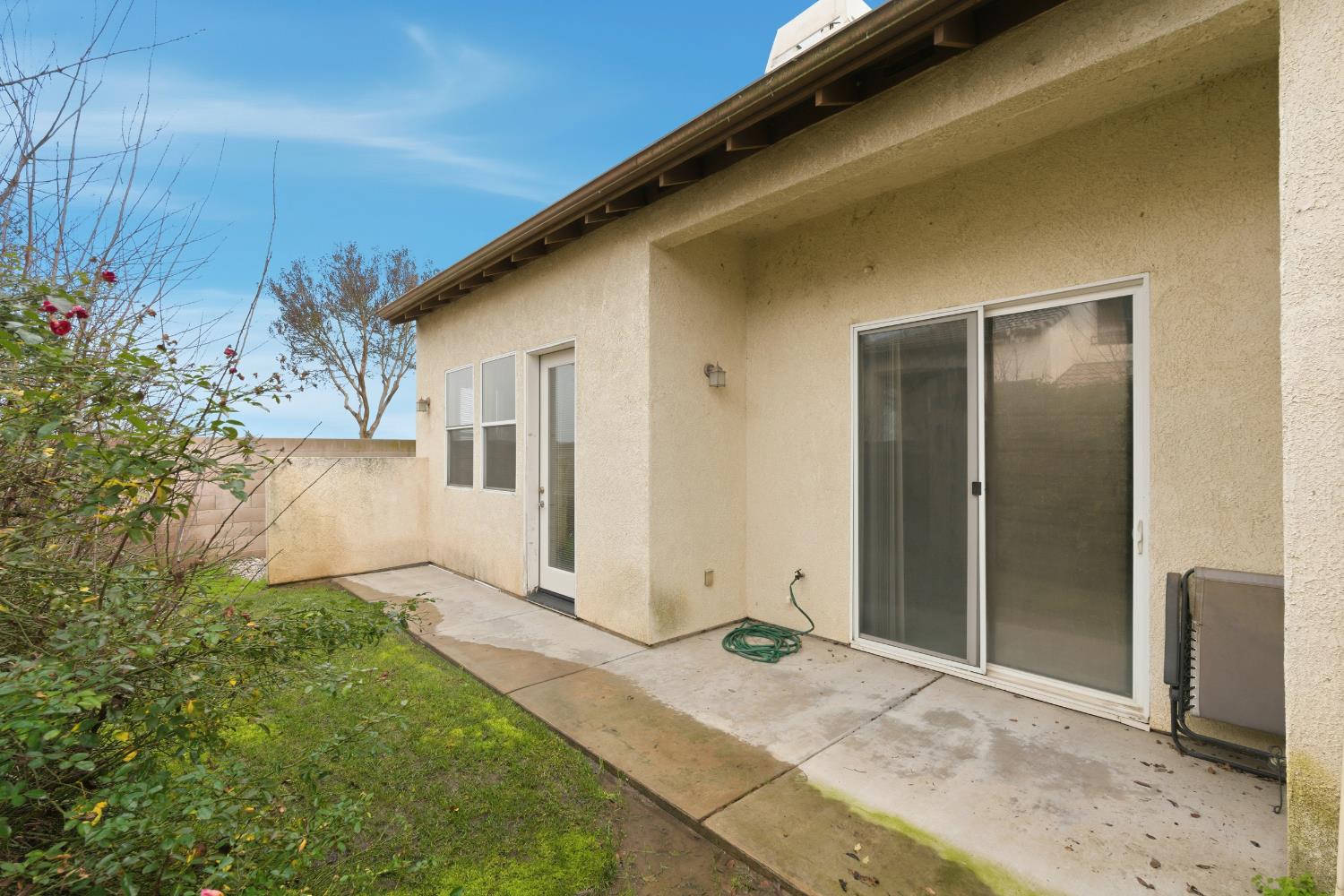 2450 Como Corte Chowchilla, CA 93610 - Photo 31 of 42 a view of backyard with garage