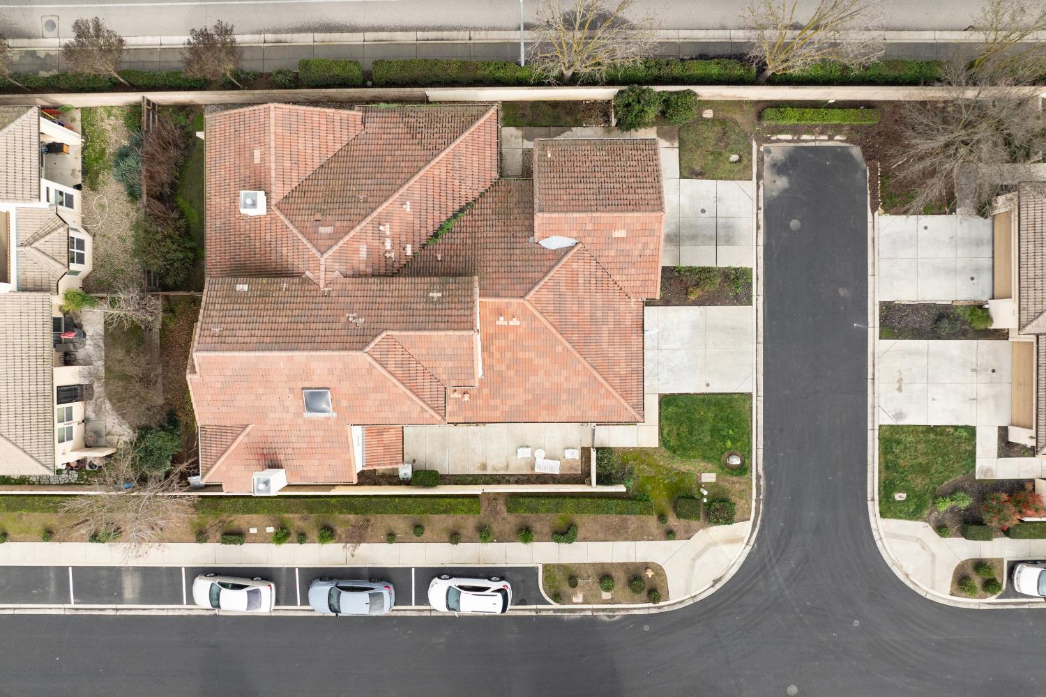 2450 Como Corte Chowchilla, CA 93610 - Photo 34 of 42 an aerial view of a house with a yard and lake view