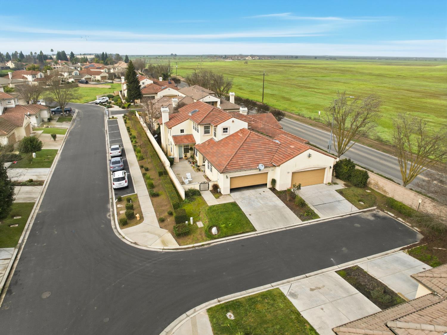 2450 Como Corte Chowchilla, CA 93610 - Photo 35 of 42 an aerial view of residential houses with outdoor space