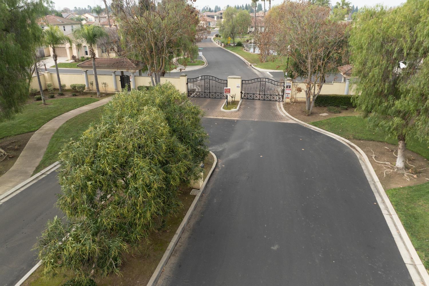 2450 Como Corte Chowchilla, CA 93610 - Photo 42 of 42 a view of a house with a yard and pathway