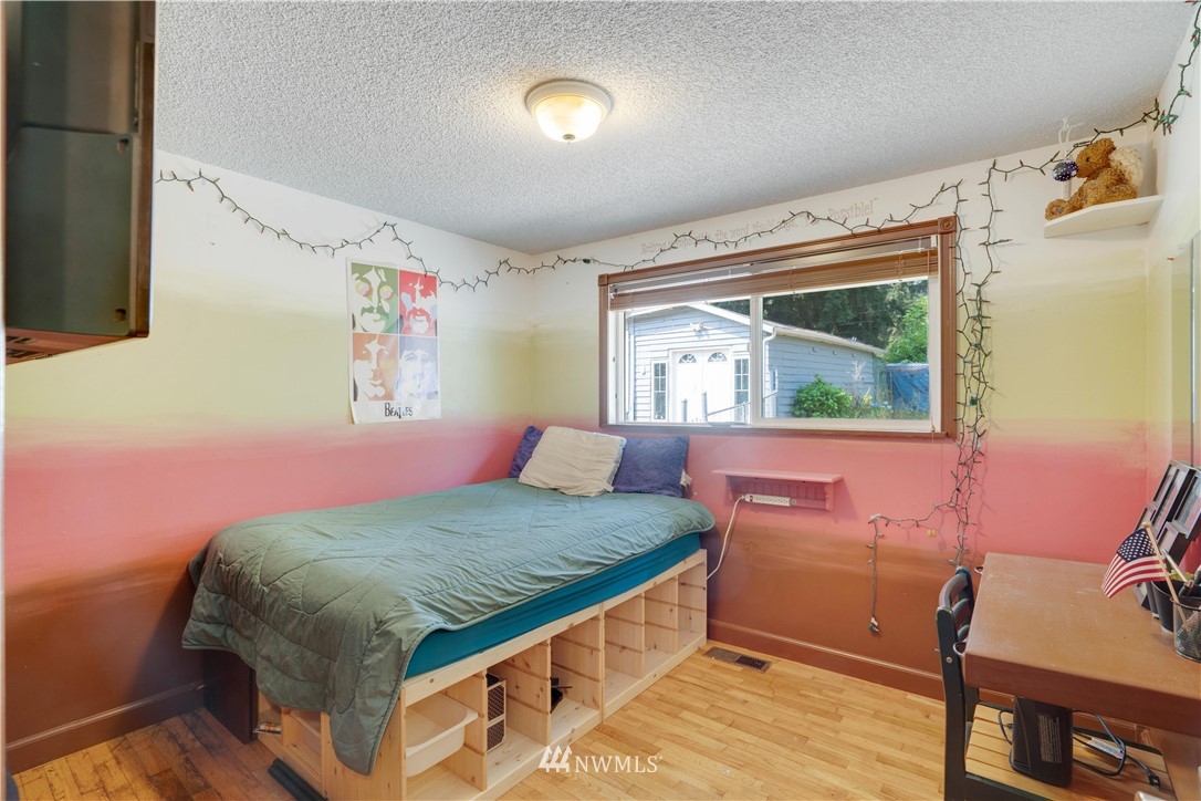 16619 192nd Avenue Southeast Renton, WA 98058 - Photo 12 of 37 a bedroom with a bed and a window