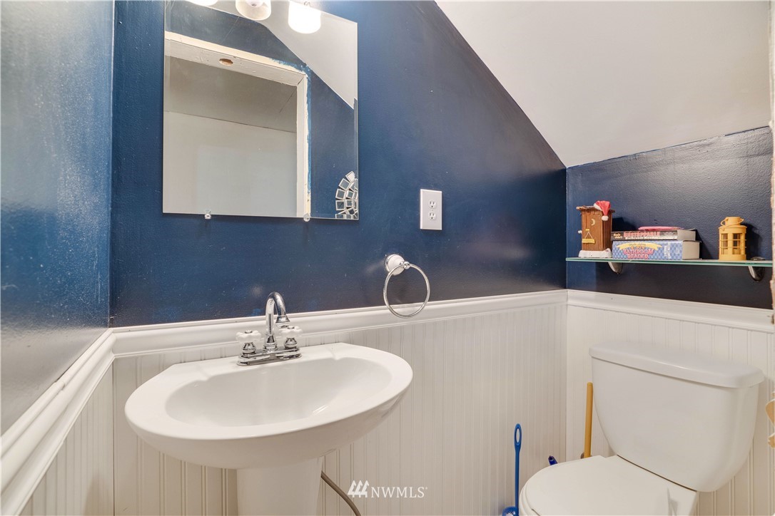 16619 192nd Avenue Southeast Renton, WA 98058 - Photo 18 of 37 a bathroom with a toilet a sink and a mirror