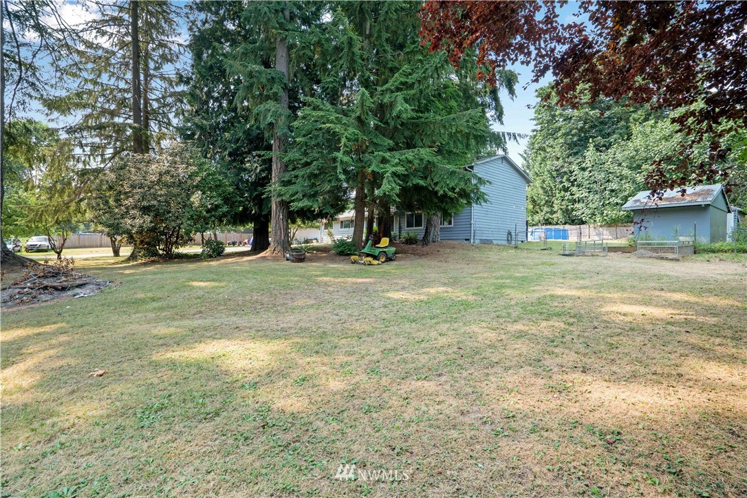 16619 192nd Avenue Southeast Renton, WA 98058 - Photo 3 of 37 a view of a tree in front of a house