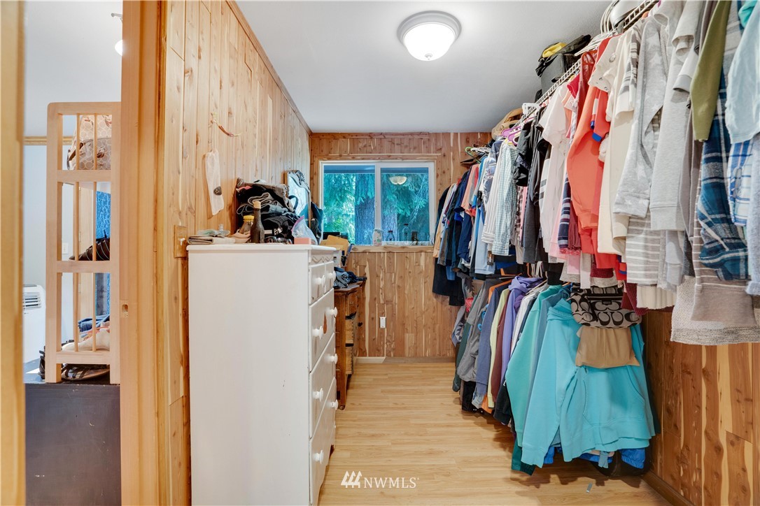 16619 192nd Avenue Southeast Renton, WA 98058 - Photo 25 of 37 a view of walk in closet with clothes and shoes