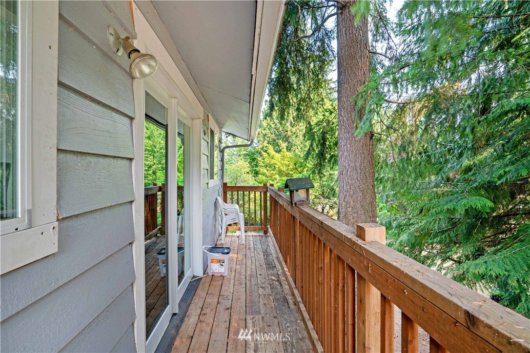 16619 192nd Avenue Southeast Renton, WA 98058 - Photo 26 of 37 a view of balcony with wooden floor and fence