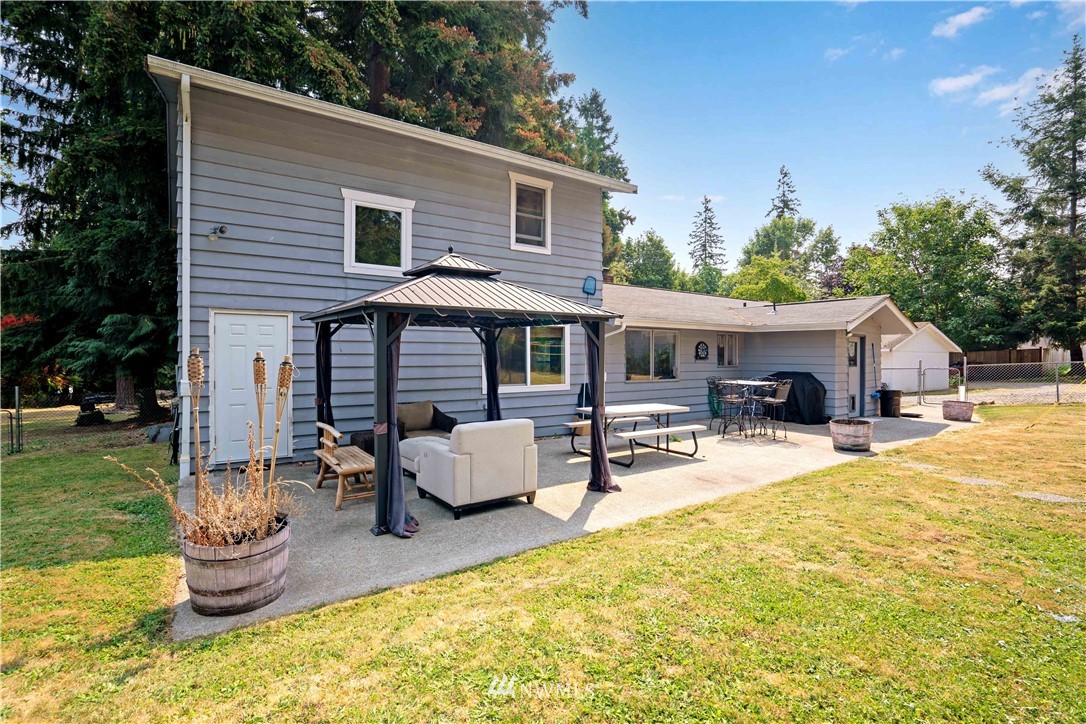 16619 192nd Avenue Southeast Renton, WA 98058 - Photo 31 of 37 a front view of house with yard and seating