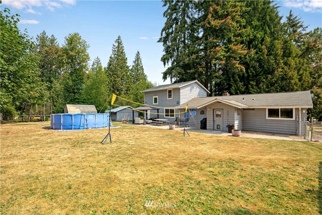 16619 192nd Avenue Southeast Renton, WA 98058 - Photo 32 of 37 a house with trees in the background