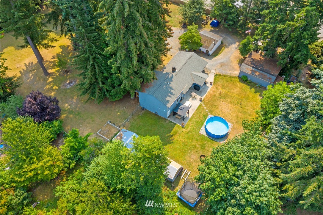 16619 192nd Avenue Southeast Renton, WA 98058 - Photo 35 of 37 an aerial view of a house with a swimming pool yard and outdoor seating