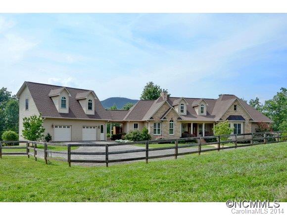 111 Pardo Road Landrum, SC 29356 - Photo 1 of 24 a front view of a house with a yard