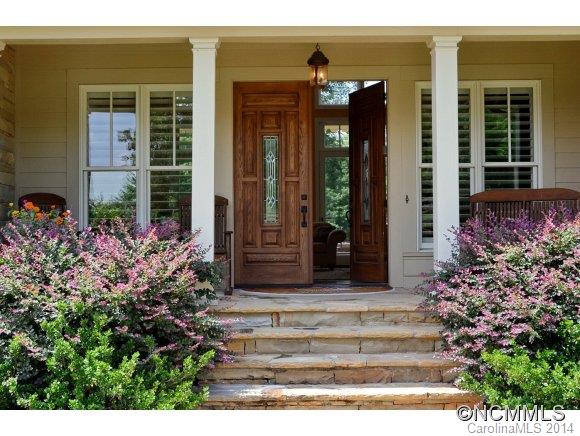111 Pardo Road Landrum, SC 29356 - Photo 2 of 24 a view of a house with potted plants