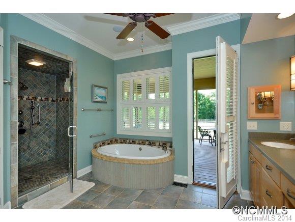 111 Pardo Road Landrum, SC 29356 - Photo 12 of 24 a bathroom with a sink and a mirror