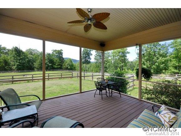 111 Pardo Road Landrum, SC 29356 - Photo 14 of 24 a view of a roof deck with wooden floor and fence