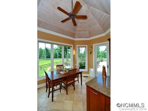 111 Pardo Road Landrum, SC 29356 - Photo 9 of 24 a dining room with furniture and a large window
