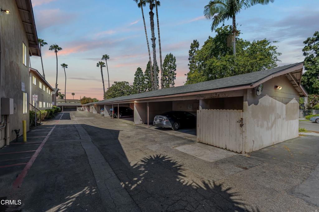 1920 North H Street, Unit 233 Oxnard, CA 93036 - Photo 15 of 26 a front view of a house with a yard