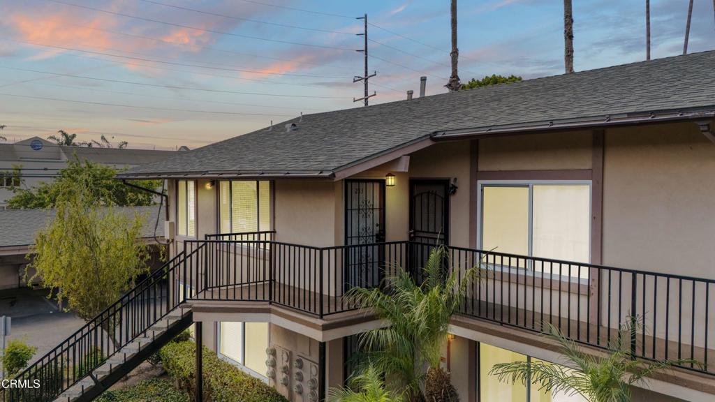 1920 North H Street, Unit 233 Oxnard, CA 93036 - Photo 2 of 26 a view of a house with a balcony