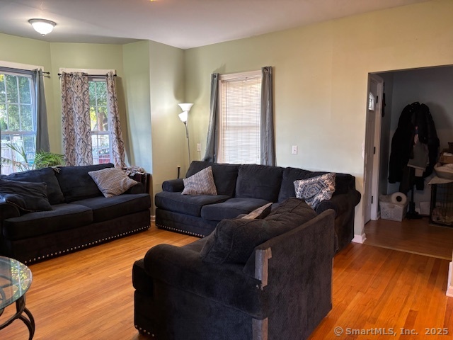 193 Wakelee Avenue Ansonia, CT 06401 - Photo 14 of 38 a living room with furniture and a large window