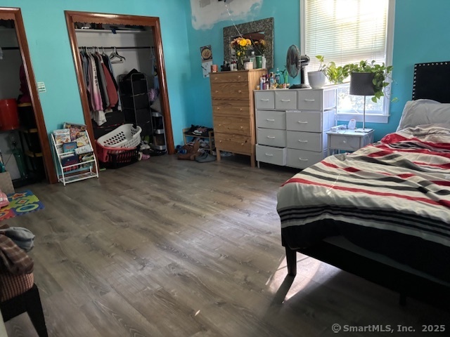 193 Wakelee Avenue Ansonia, CT 06401 - Photo 27 of 38 a bedroom with a bed and furniture