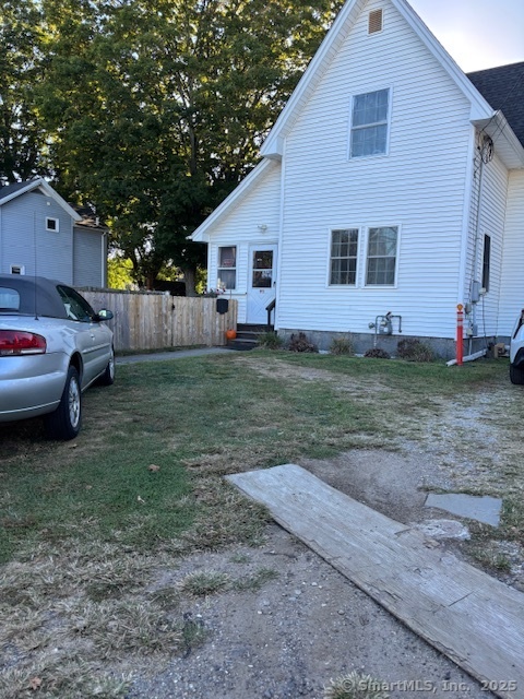 193 Wakelee Avenue Ansonia, CT 06401 - Photo 3 of 38 a view of a yard with a house and a yard