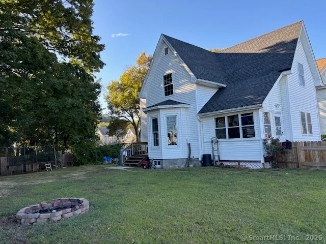 a front view of house with garden