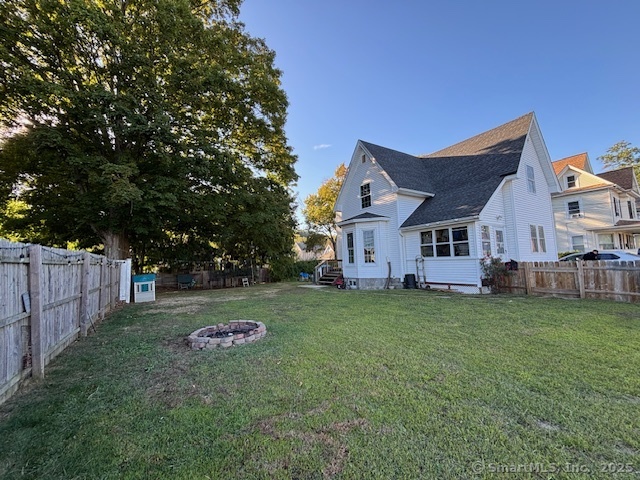 193 Wakelee Avenue Ansonia, CT 06401 - Photo 8 of 38 a front view of a house with a yard